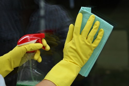 Office cleaning team working in a modern E16 commercial workspace