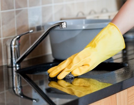 Commercial cleaning team working in an E16 office reception area