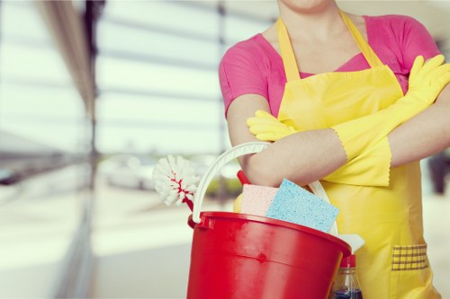 Cleaner maintaining a shared office space in E16
